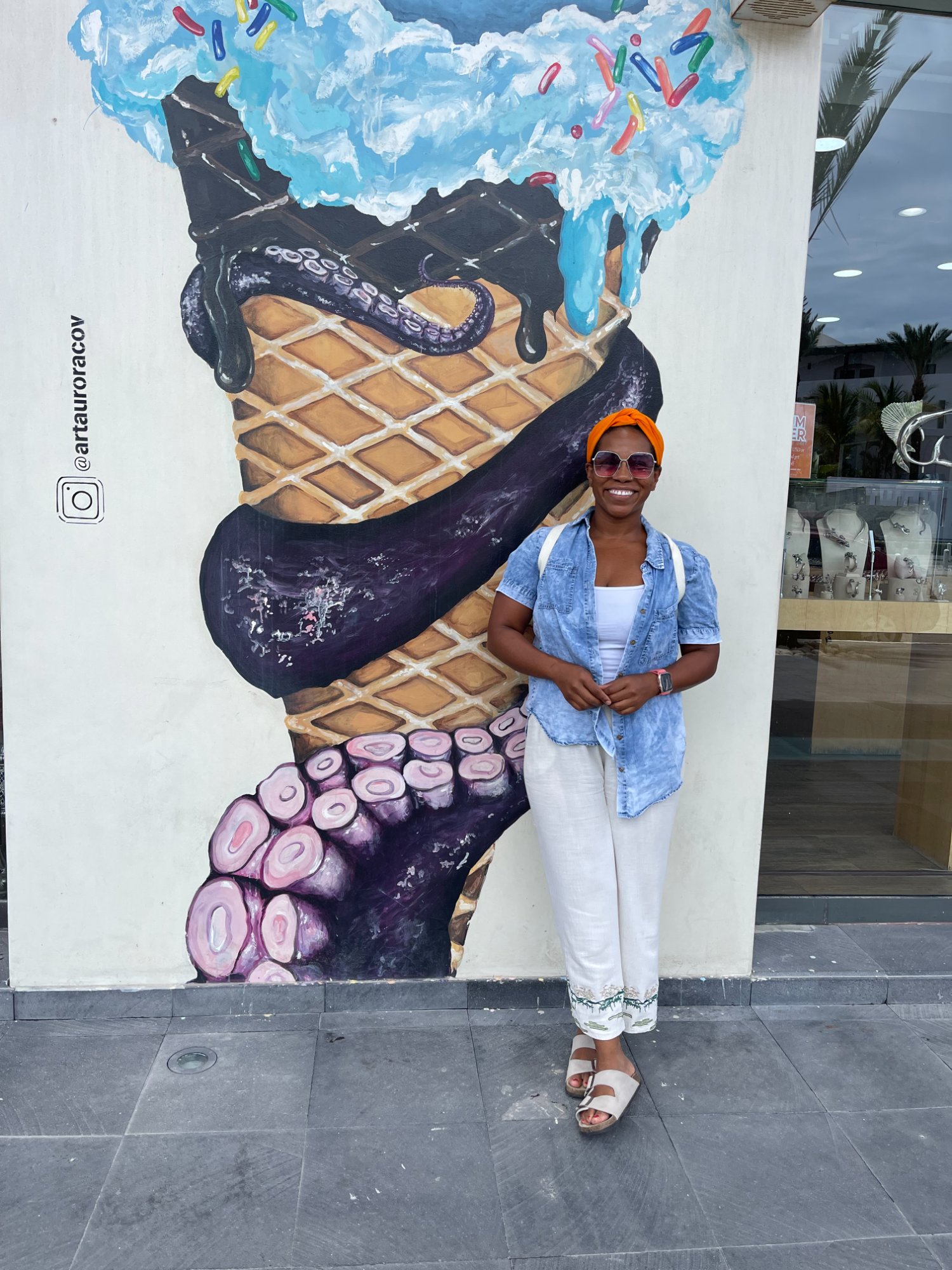 Sandra in front of street art abroad